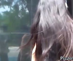 Fetish asian whore peeing in..
